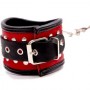 Фигурные красно-чёрные наручники с клёпками (Подиум Р23А)