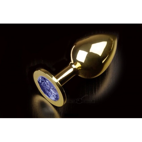 Большая золотая анальная пробка с закругленным кончиком и синим кристаллом - 9 см. (Пикантные штучки DPRLG252BLUE)