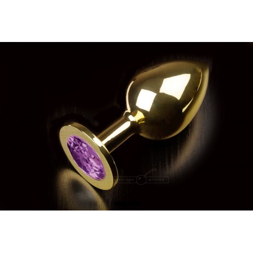 Большая золотая анальная пробка с закругленным кончиком и фиолетовым кристаллом - 9 см. (Пикантные штучки DPRLG252PUR)